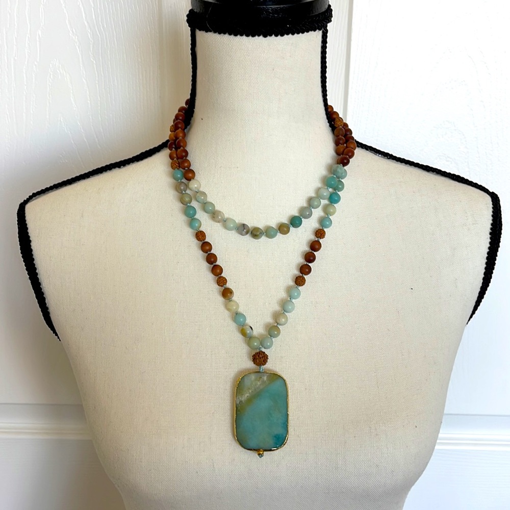 Turquoise and sandalwood long necklace.